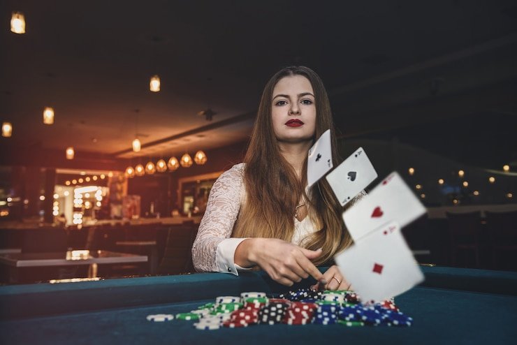Player placing bets on xo363 live roulette table via mobile phone